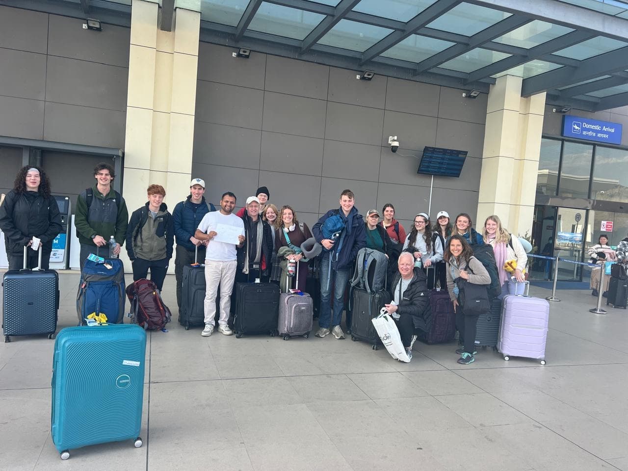 Welcoming Luther College students at Pokhara airport, bags in hand
